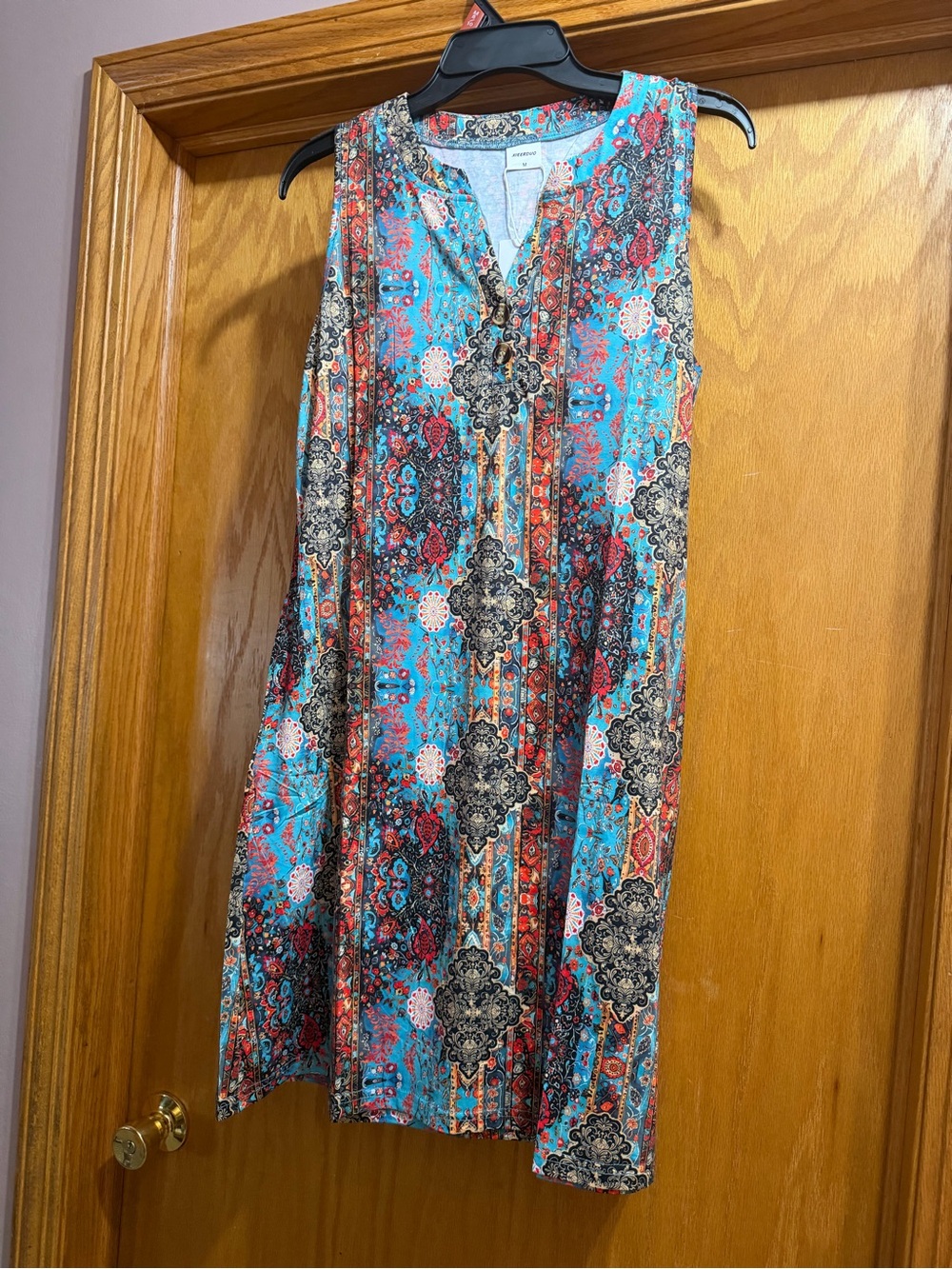 Sleeveless Turquoise Multi-Print V-Neck dress